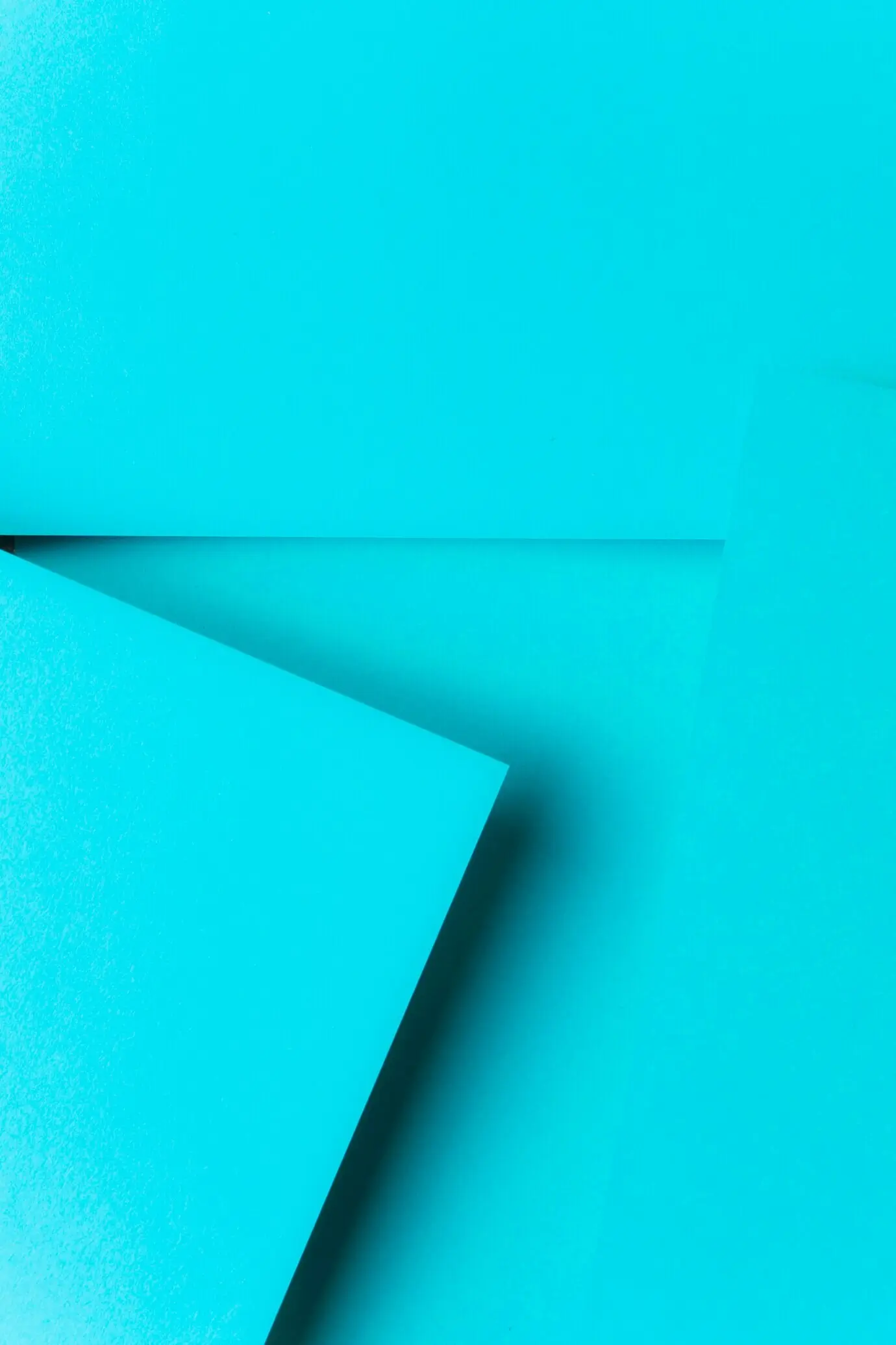 Geometrische papieren achtergrond in turkoois